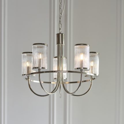 A front view of the Yarn 5 Arm Chandelier in Nickel, prominently displayed in a room setting.