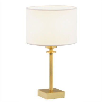 White drum shade table lamp with brushed brass base and vertical support pole.