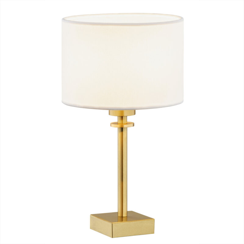 White drum shade table lamp with brushed brass base and vertical support pole.
