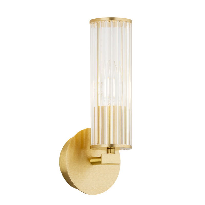 Brass wall light with ribbed glass shade shown with the light bulb off.