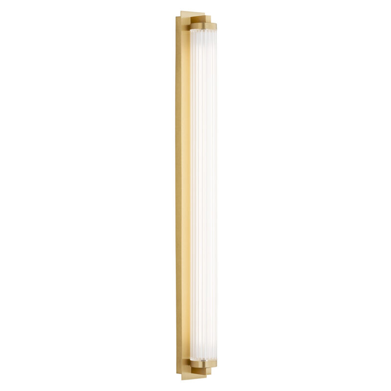 Left side illuminated view of a brass cylinder shaped led wall light.
