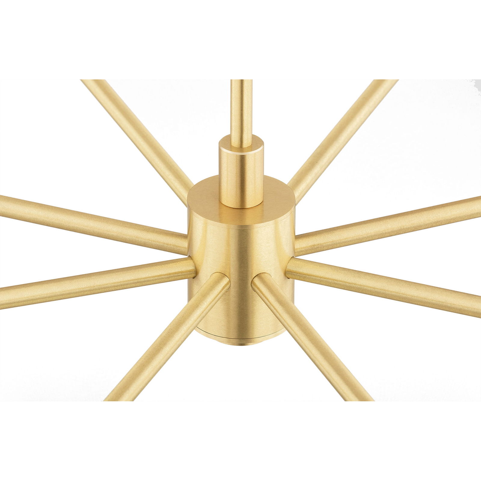 Central brass hub of Ampton chandelier showing eight arms radiating outward.