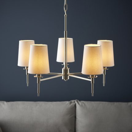 Zoomed-in, eye-level, front-facing view of the Lilt Chandelier in chrome nickel, featuring 5 arms and vintage white shades, 60cm in size.