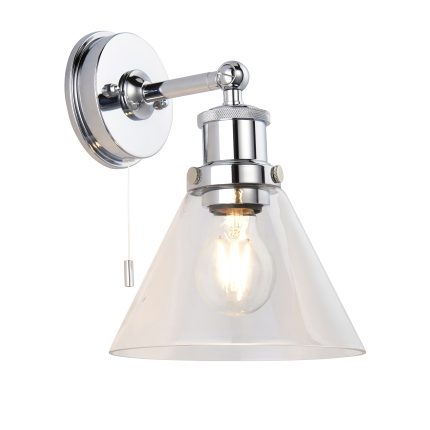 Habe Bathroom Wall Light with light bulb on, viewed from an angle against a white background.