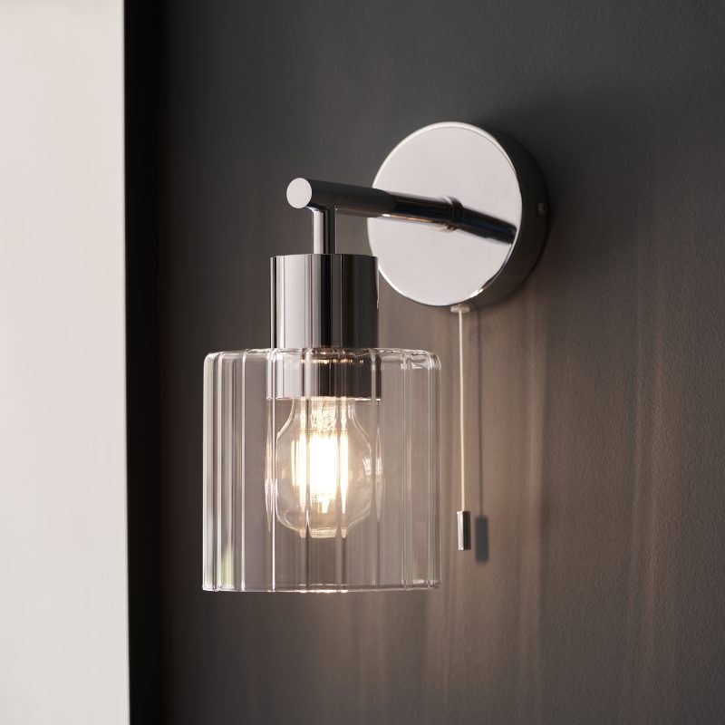 Close up view of Morris Wall Lamp with ribbed glass shade.