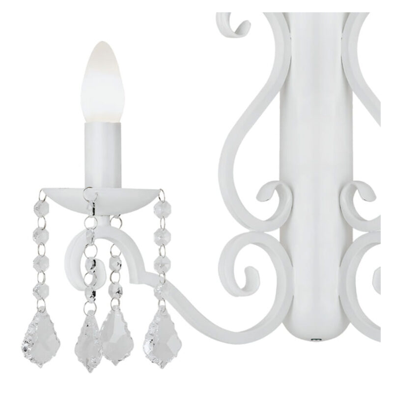 Close-up of white Dema wall light showing crystal droplets and candle holder.