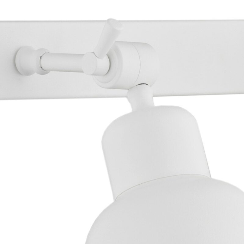 Close-up of white wall light joint mechanism showing adjustable movement.