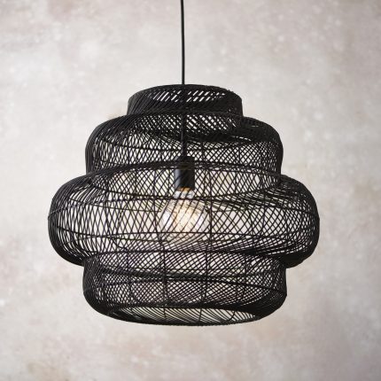 Zoomed-in front-facing view of the shade of the large Oasis Pendant Lamp made from black rattan, 52.5cm wide.