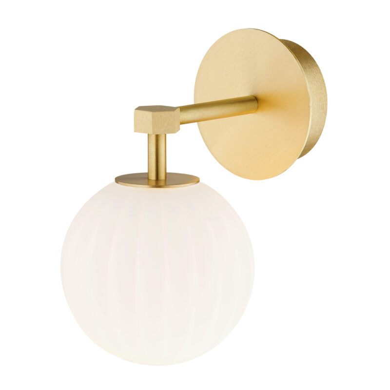 Wall light with brass finish and matt opal ribbed glass shade mounted in downward position.