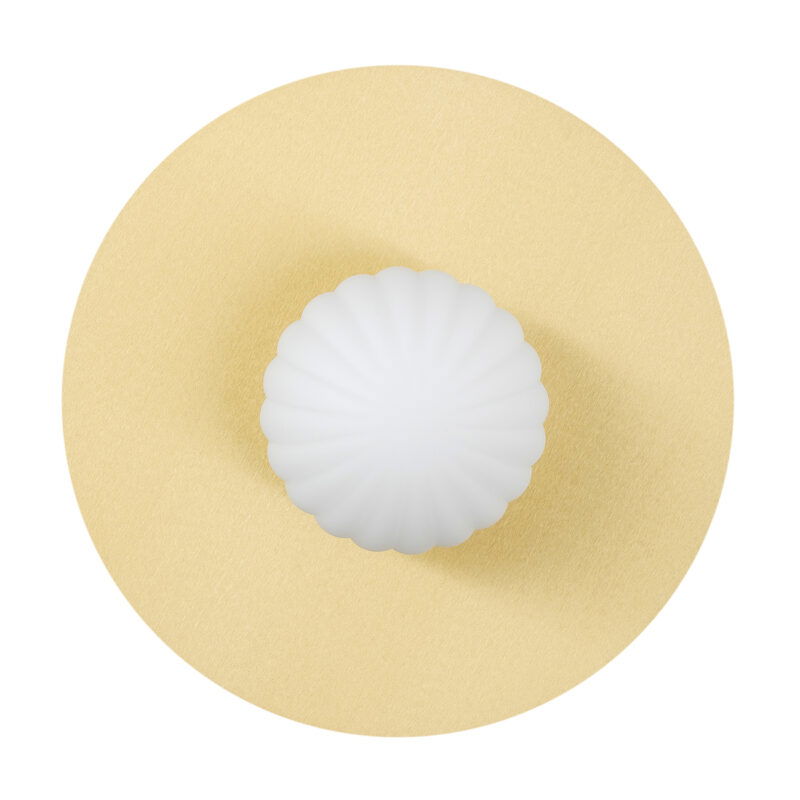 Front view of circular wall light with brass frame and unlit opal glass shade.