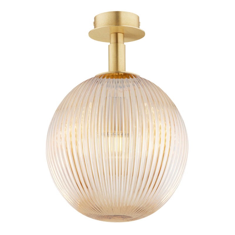 Front view of lit Loma ceiling light showing illuminated single bulb through 25cm honey glass shade creating warm amber glow.
