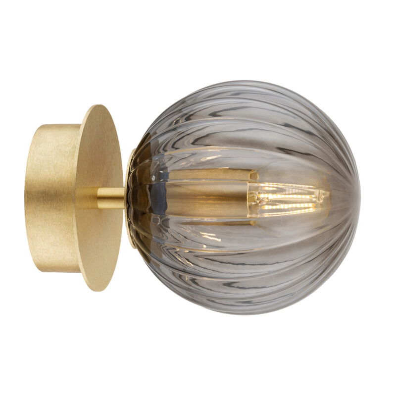 Side view of 12cm Loma Mini wall-mounted light with smoked glass sphere shade and brass mount showing flush installation.