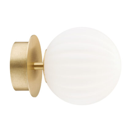Wall mounted flush light with brass rim and round opal glass shade.