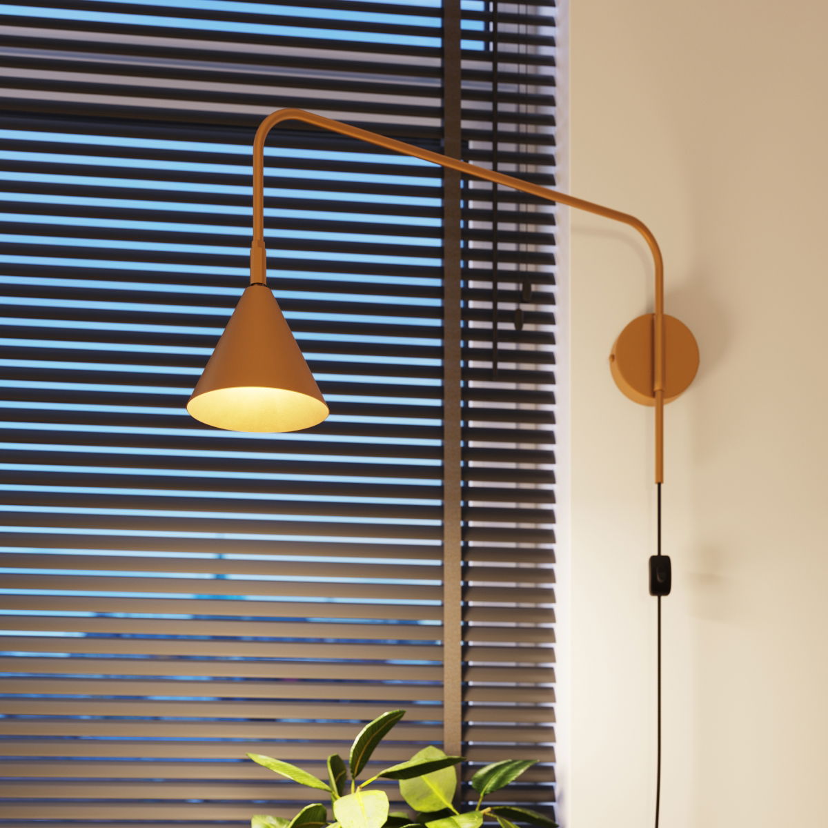 nox-wall-lamp-gold-13 Gold plugin wall light attached to a white wall with extended arm.