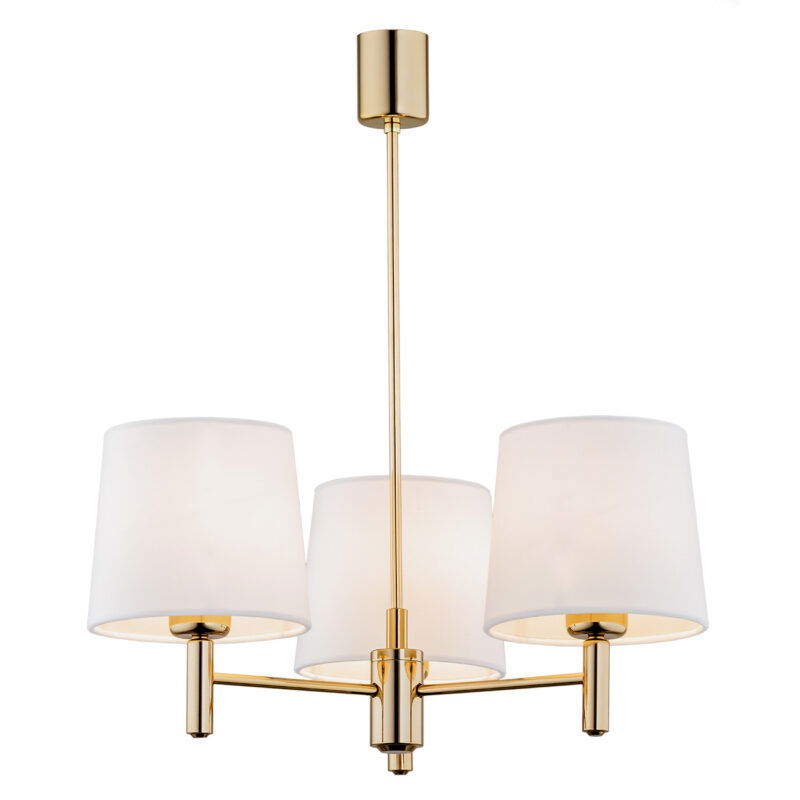 Three arm brass chandelier with cream shades lit.