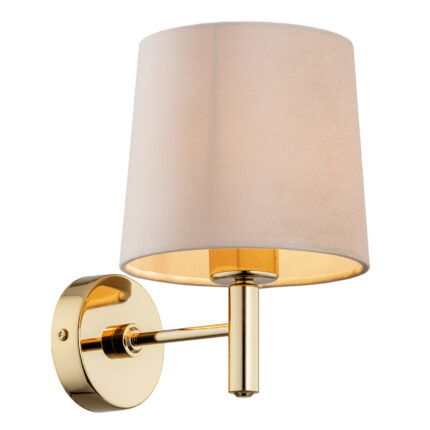 Left side view of a brass wall light with beige lampshade.